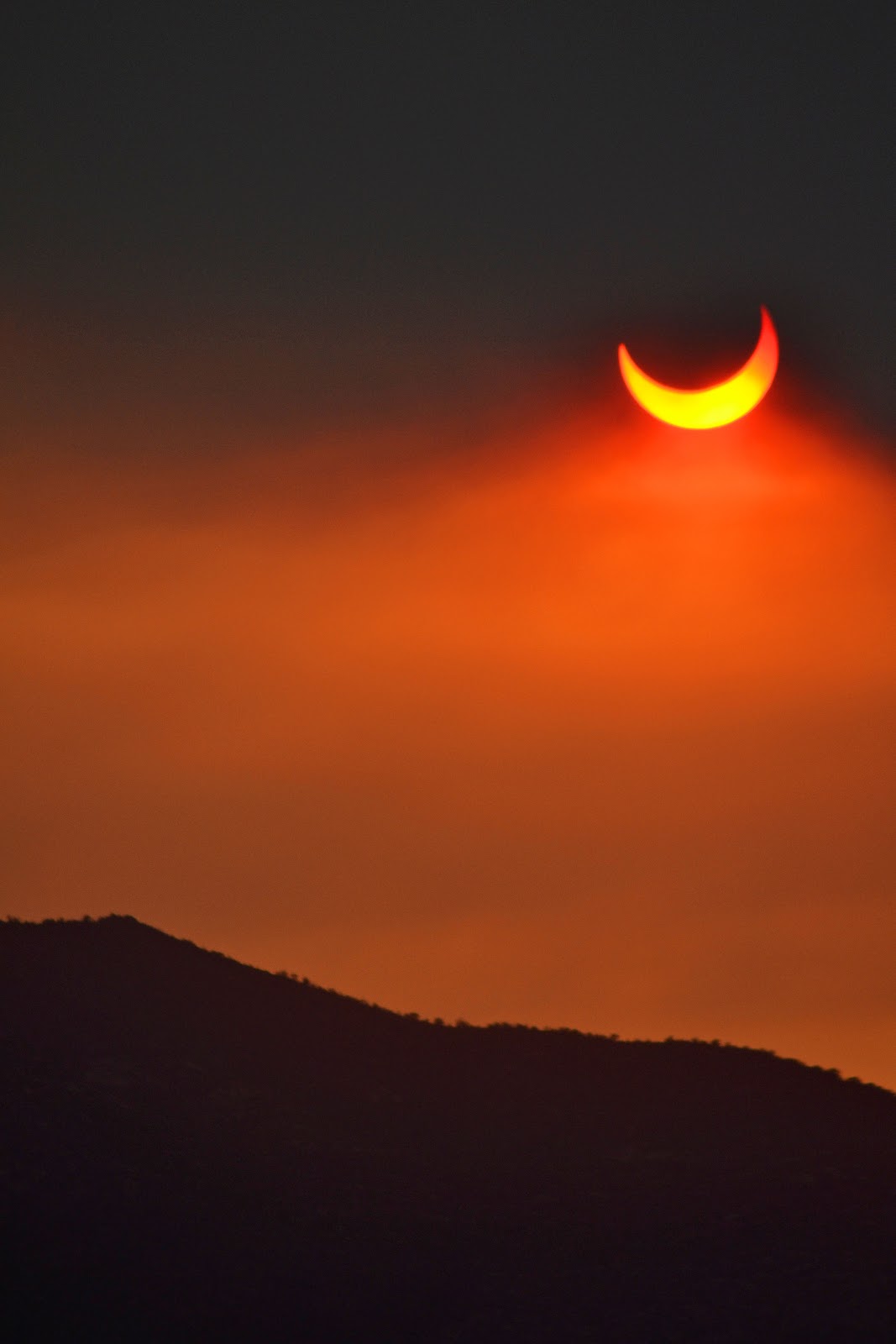 Tangible Daydreams Annular Eclipse through the Arizona wild fires