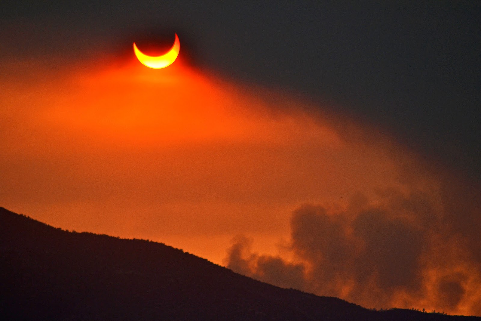 Tangible Daydreams Annular Eclipse through the Arizona wild fires