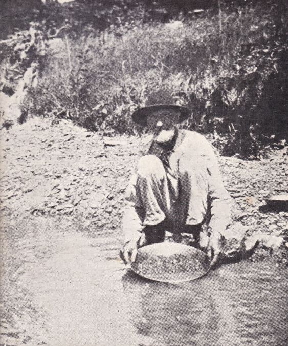 John Merriman panning for gold