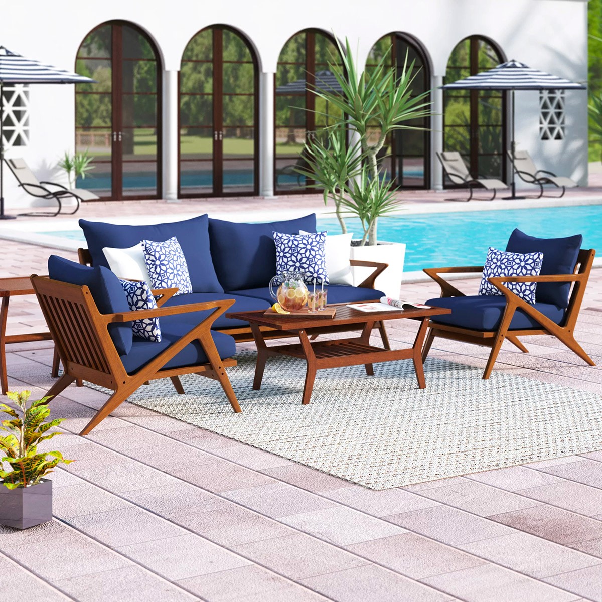 scandinavian outdoor furniture set with blue cushions solid wood frames