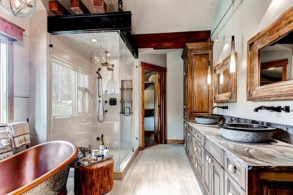 Luxury Bathroom with Wood Vanity Cabinets & Cooper Tub