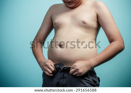 Fat boy can\'t button up his pants, Healthy and lose weight concept