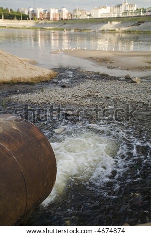 Dump of dirty water in the river