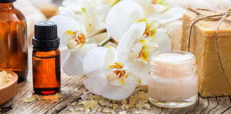 Moisturizing cream and essential oil - spa and massage concept