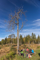 In front of the cabin in the autumn sunshine