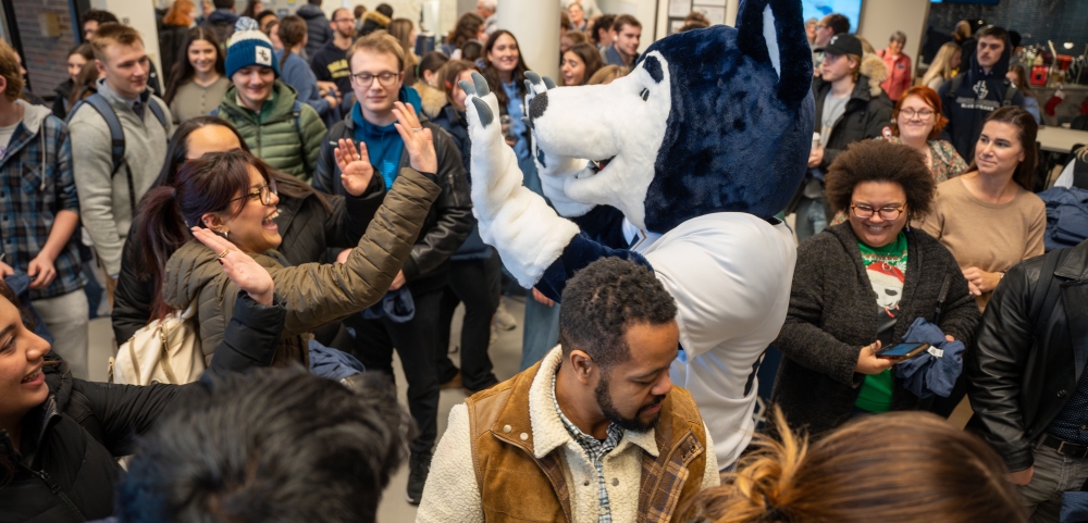 Lobo the Wolf greeting students at his release event 