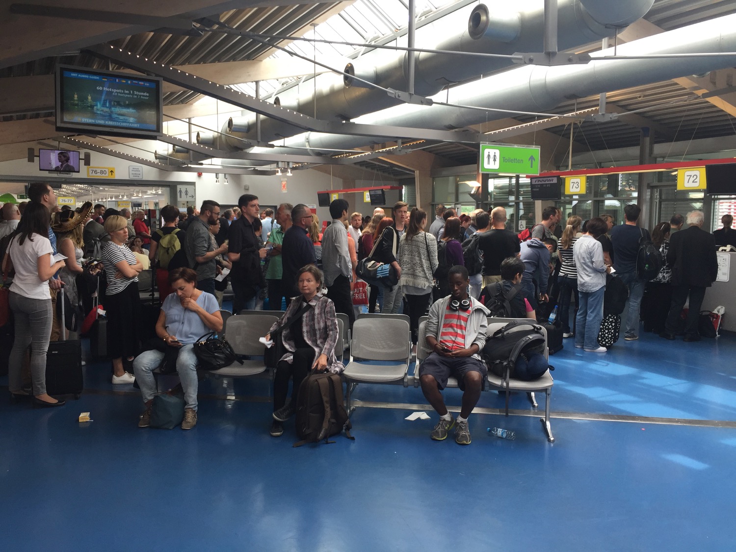 a group of people in a terminal