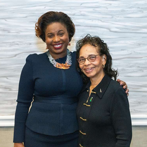 Dean Shakira Henderson and Evelyn Mickle pose for a photo.