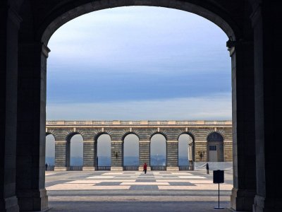 Enjoy the city view from the gallery of the Royal Palace in Madrid