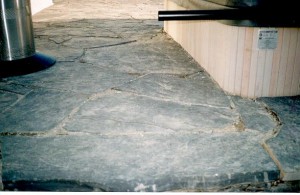 Rundle Stone Slab Patio wrapping around hot tub