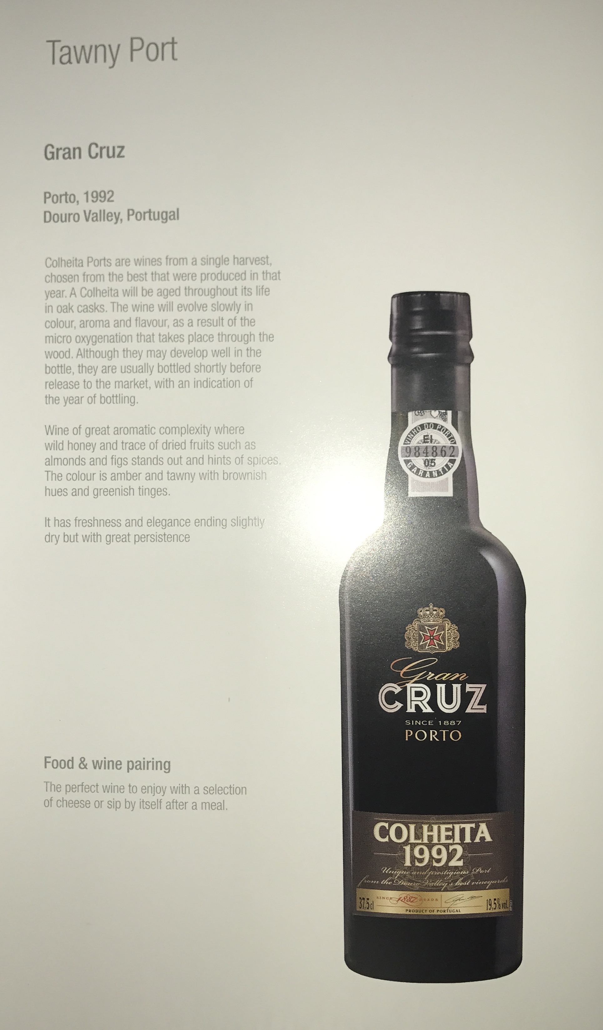 a poster of a bottle of wine