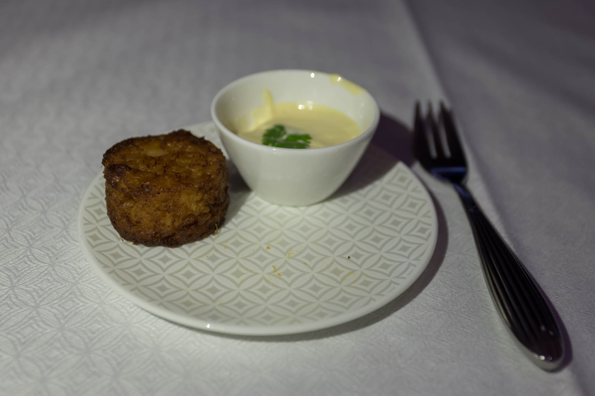 a plate with food on it and a fork