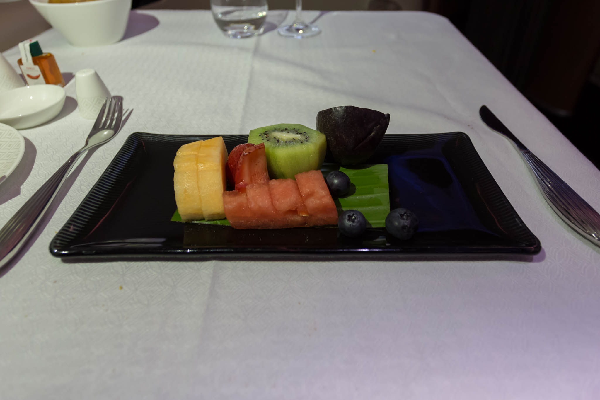 a plate of fruit on a table