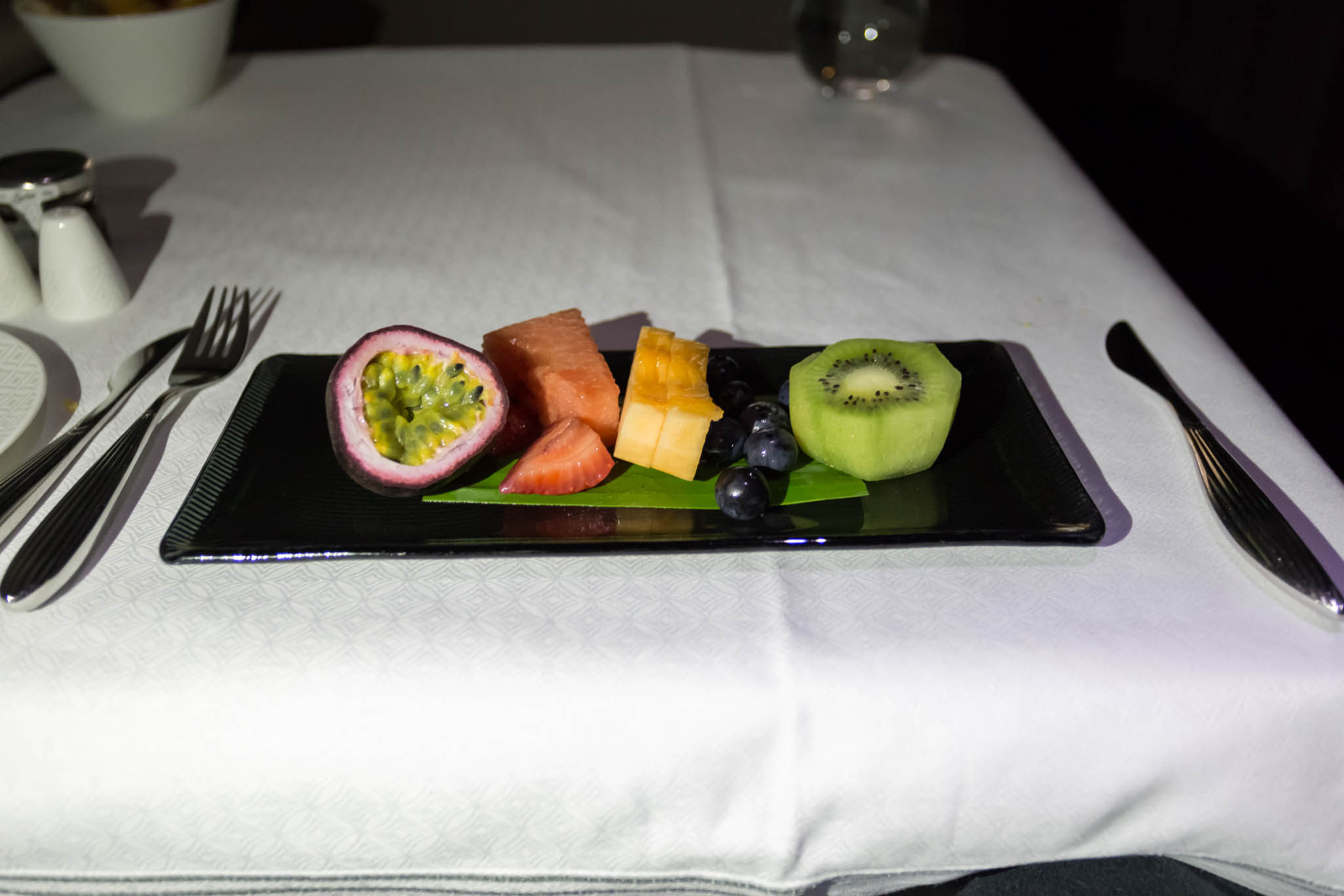 a plate of fruit on a table