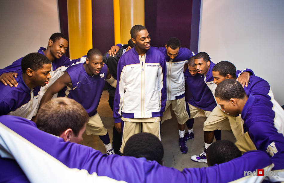 The Washington Huskies men's basketball teams gathers near the locker room before being announced at the season opener against McNeese State Cowboys at Hec Edmundson Pavilion. (Photo by Dan DeLong/Red Box Pictures)