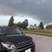 Green skies from a high precipitation supercell hitting timmins