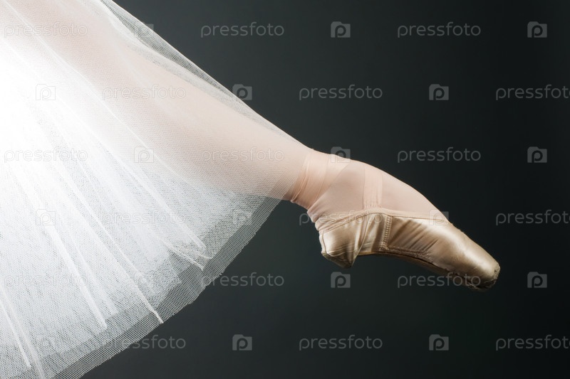 Legs in ballet shoes