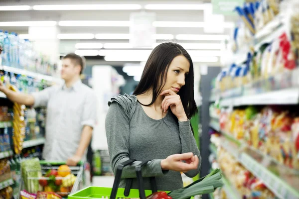 Couple at supermarket