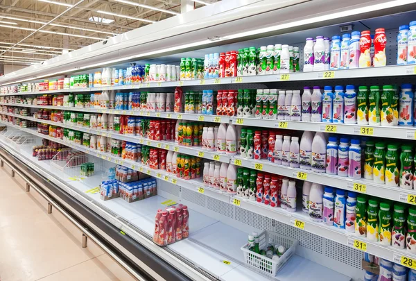 Fresh milk produces ready for sale in Auchan Samara Store