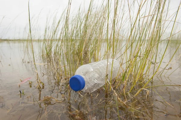 Garbage junk dumped in water