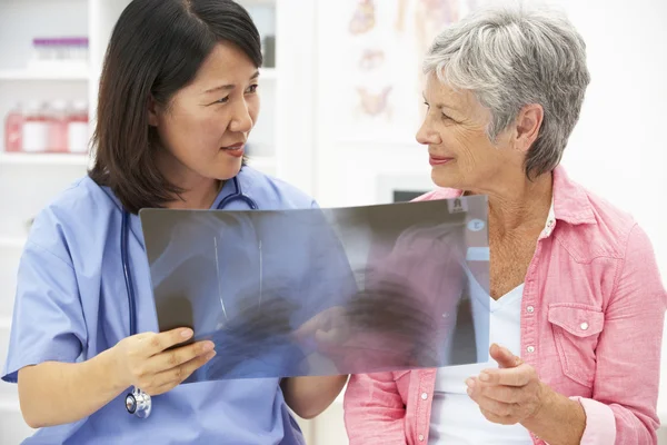 Doctor with female patient