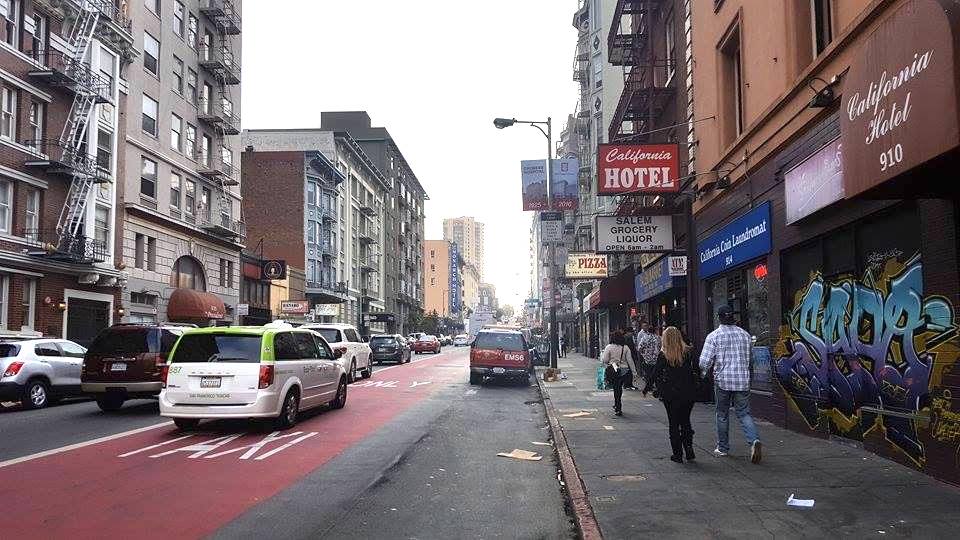 Street, sidewalks, and building in the Tenderloin neighborhood of San Francisco.