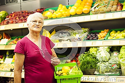 Senior woman in groceries store