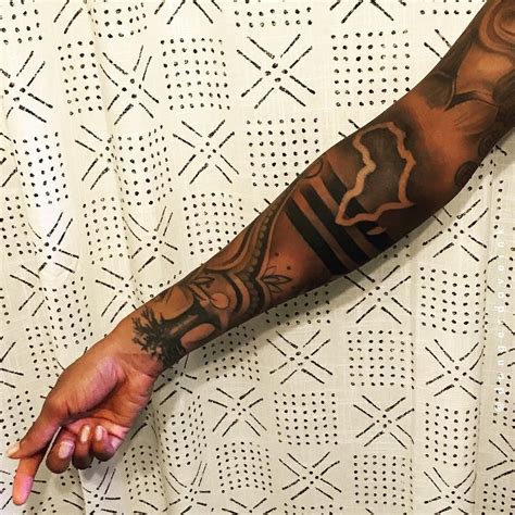 African Sleeve Tattoo on Forearm