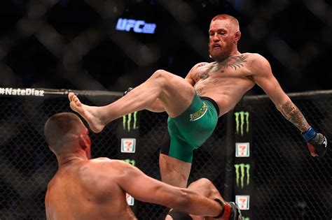 UFC : CONOR MCGREGOR AVENGES FIRST LOSS , DEFEATS NATE DIAZ IN ' BAD ...