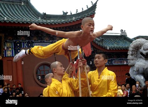 The Shaolin temple monks from Henan China in action Stock Photo - Alamy