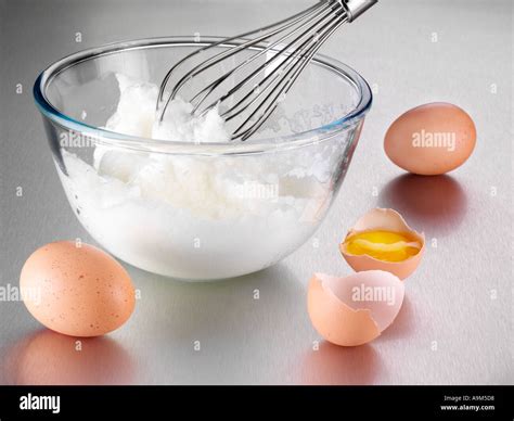 WHISKING EGG WHITES Stock Photo - Alamy