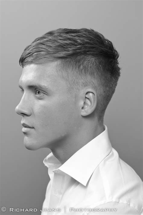 High short back & sides with neat side-brushed top and clean shaven ...