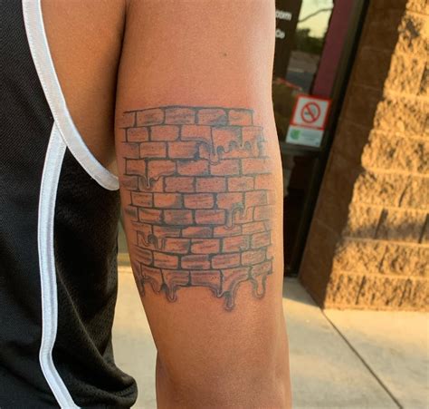 15 Brick Wall Tattoo Symbol Designs – Unleashing The Power Within ...