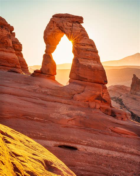 Expose Nature: A delicate formation of red rocks at sunrise, Arches ...