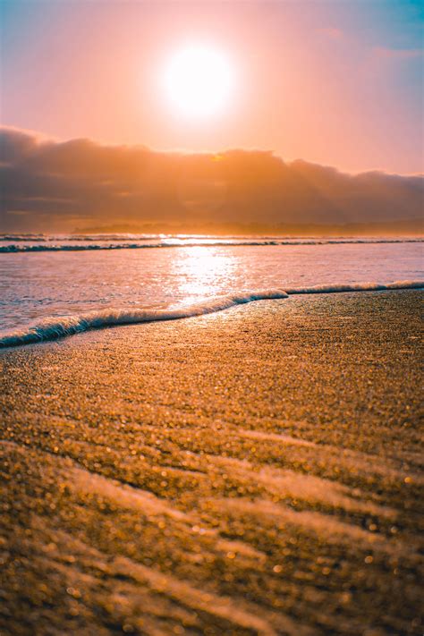 Sun rays on the beach [3650 × 5475][OC] : r/EarthPorn