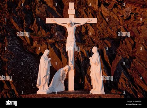 Statues of Jesus Christ on the cross and followers at the foot of the ...