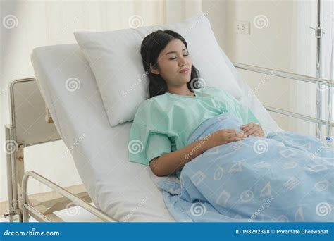 Cheerful Patient Smiling on the Bed in Hospital Stock Photo - Image of ...