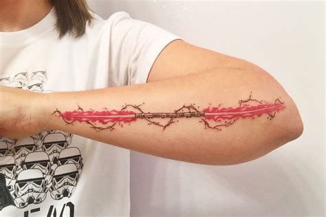 Darth Maul lightsaber tattoo | Lightsaber tattoo, Ink tattoo, Tattoos