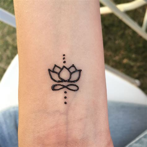 Simple Small Henna Hand Tattoo