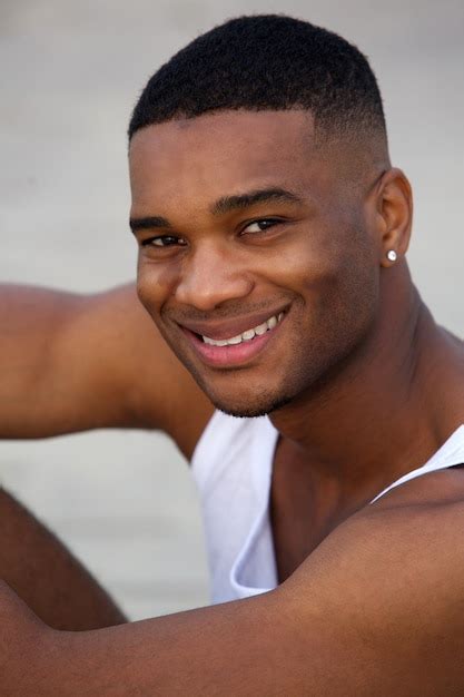 Premium Photo | Handsome african american young man smiling