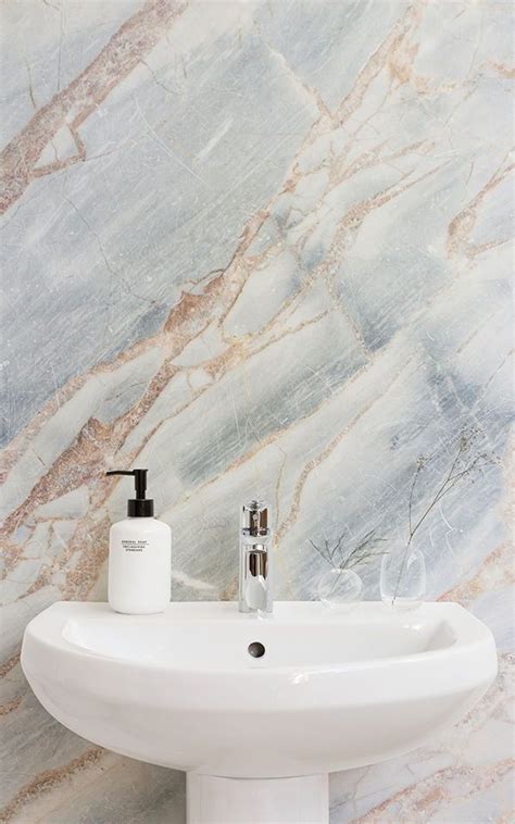 Create a classy and sophisticated bathroom space with marble effect ...