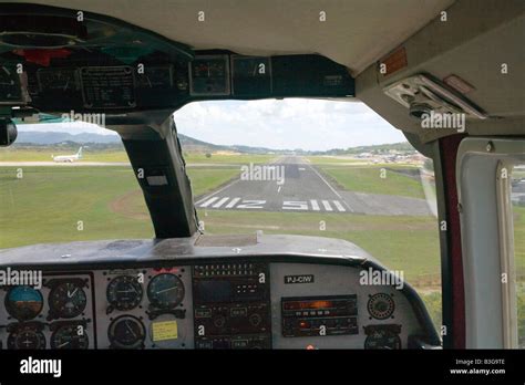 Co pilot view from cockpit , small aircraft landing at Antigua Airport ...