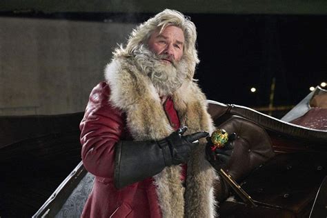 John Travolta Is Totally Unrecognizable As Santa Claus In Capital One ...