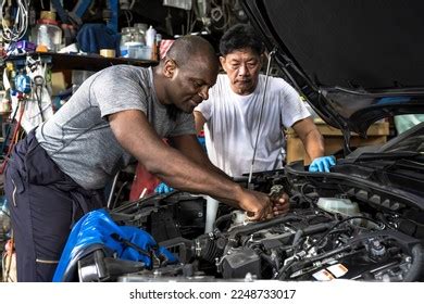 Asian Man Fixing Car: Over 5,422 Royalty-Free Licensable Stock Photos ...