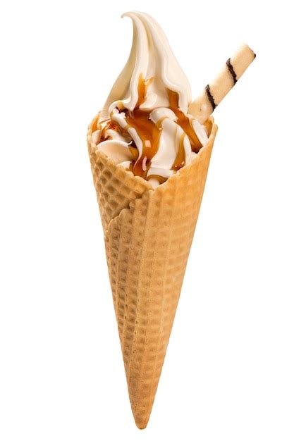 Vanilla ice cream and caramel sauce in cone | Premium Photo