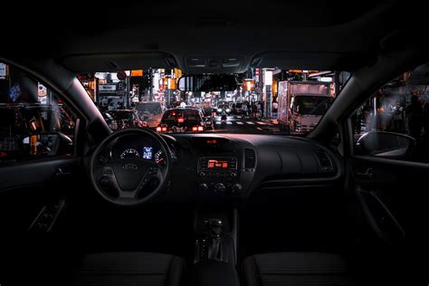 Black Car Steering Wheel and Interior during Night Time · Free Stock Photo