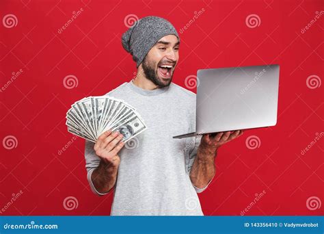 Photo of Rich Guy Holding Cash Money and Silver Laptop Isolated Over ...