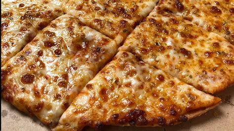 Domino's Thin Crust Pizza: What To Know Before Ordering