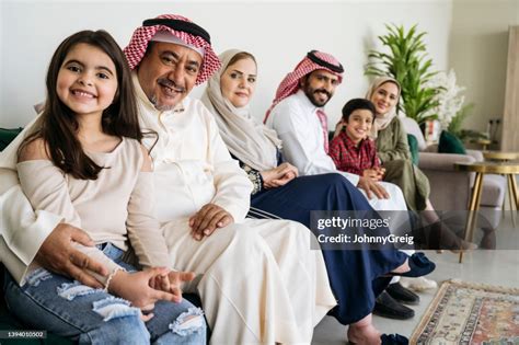 Cheerful Portrait Of Multigeneration Saudi Family At Home High-Res ...