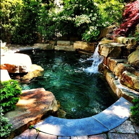 Pool waterfall, Backyard pool, Pool landscaping